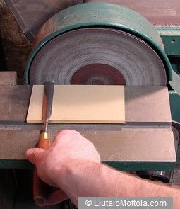 A disk sander can be used to quickly straighten up a chipped or severely worn edge